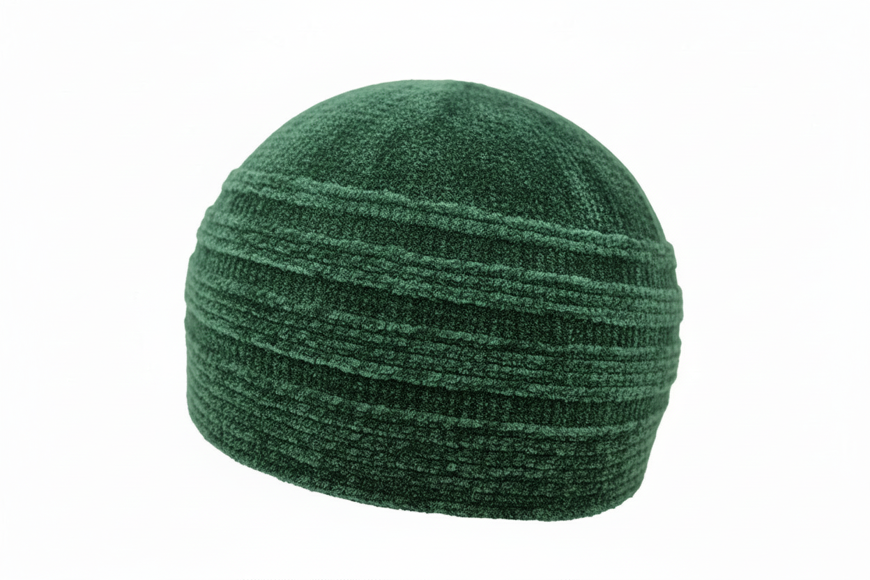 Green knit beanie on a white background
