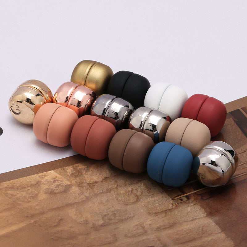 Set of colorful round objects on a wooden surface